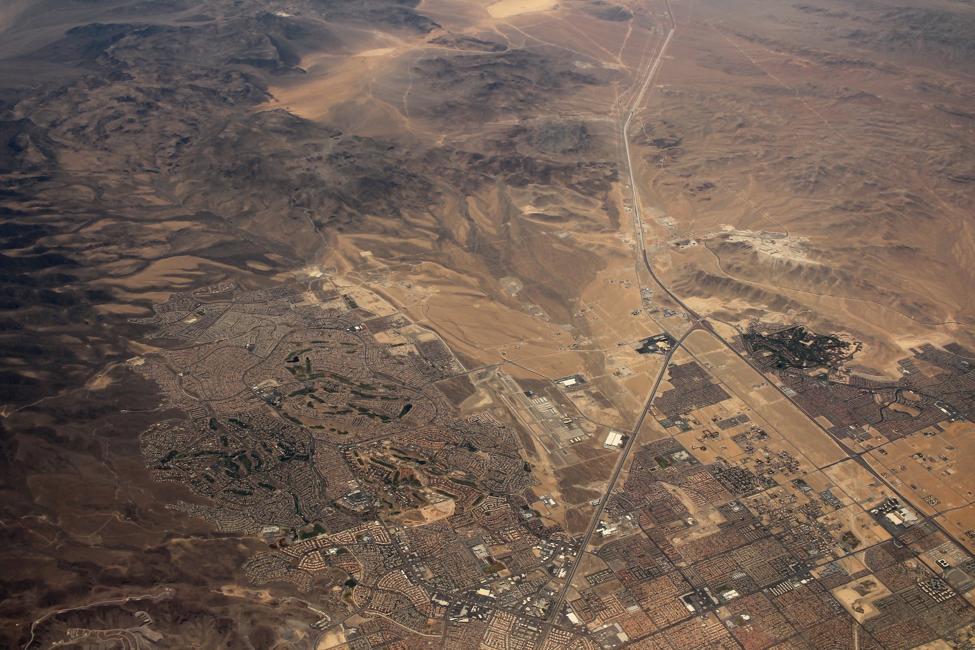 Aerial view of Enterprise, Nevada, with residential streets and desert terrain